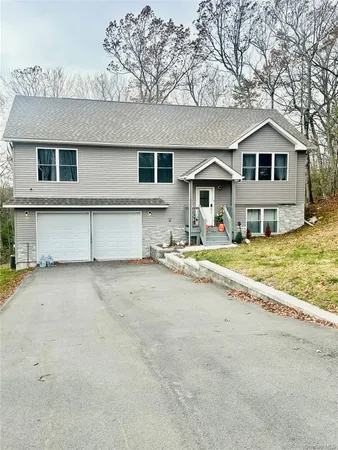 a front view of a house with swimming pool