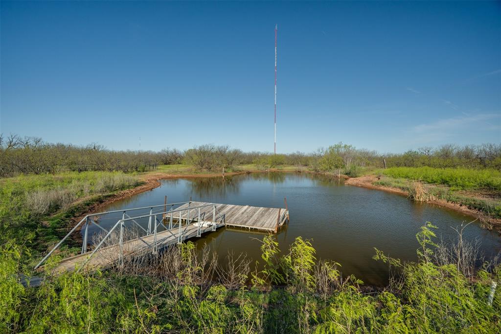 2206 Turtle Creek Road Wichita Falls, TX 76309 - Photo 37 of 38 a view of a lake with a house in the background