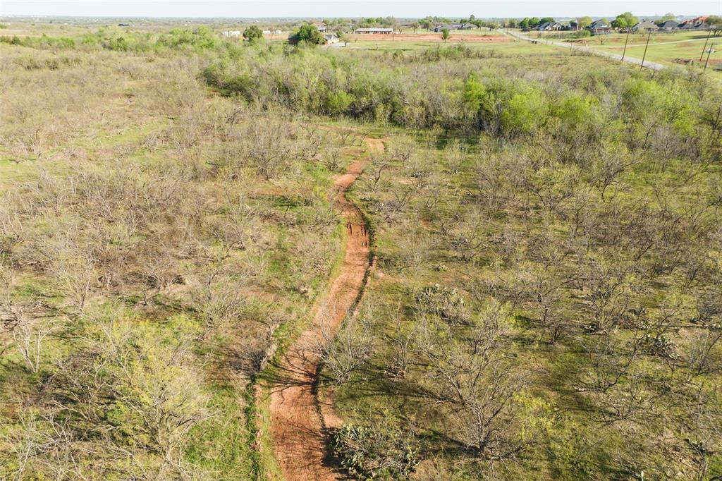 2206 Turtle Creek Road Wichita Falls, TX 76309 - Photo 6 of 38 a view of a pathway both side of yard