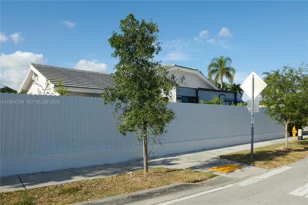 a house with trees in front of it
