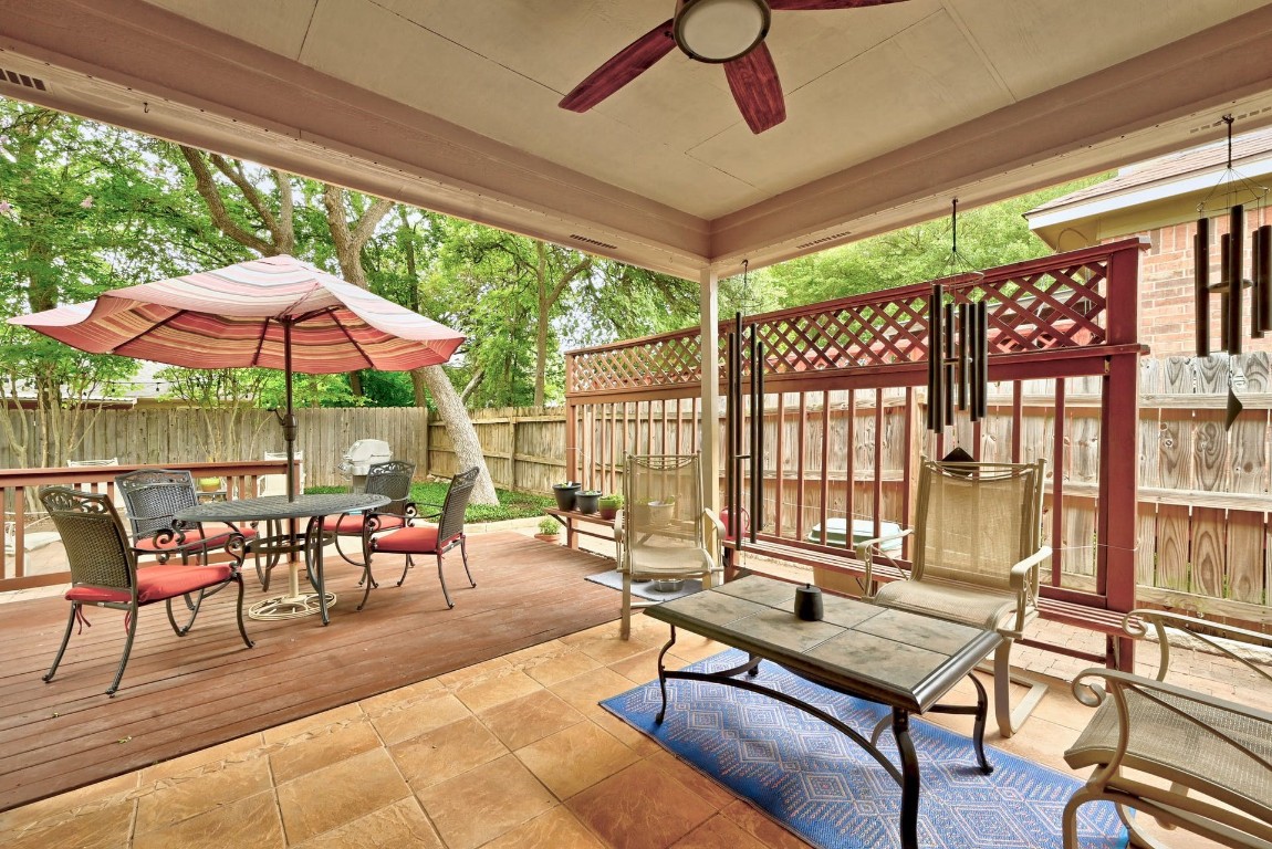 a patio with patio outdoor seating and yard