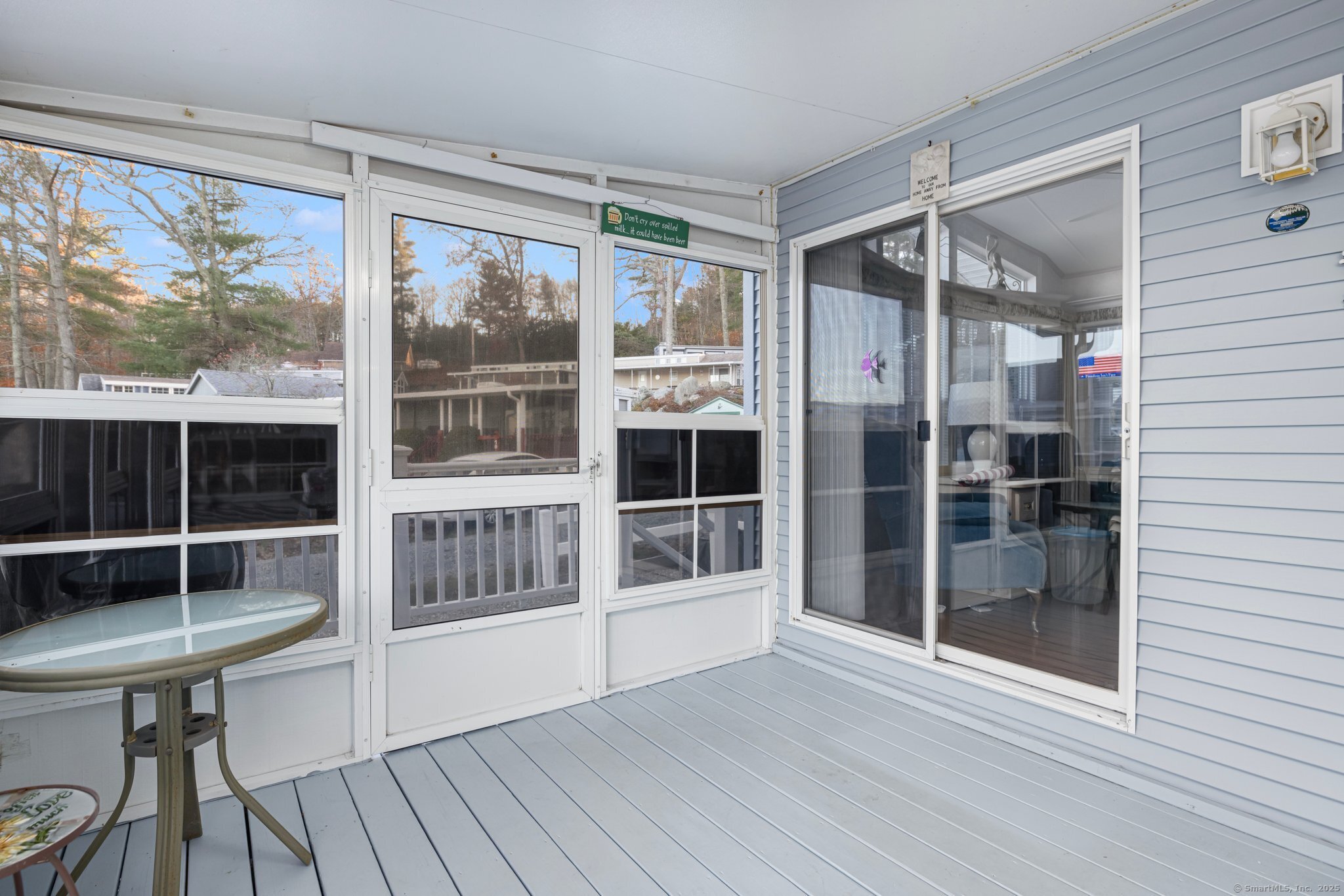 262 Shetucket Turnpike, Unit 69 Griswold, CT 06351 - Photo 12 of 37 a view of empty room with wooden floor and fan