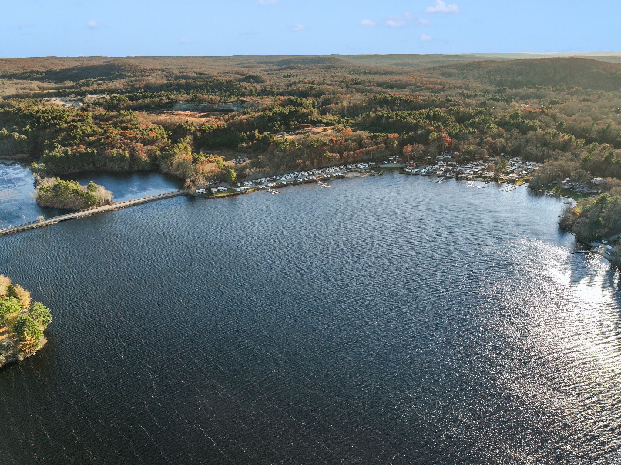 262 Shetucket Turnpike, Unit 69 Griswold, CT 06351 - Photo 32 of 37 an aerial view of a house with a lake view