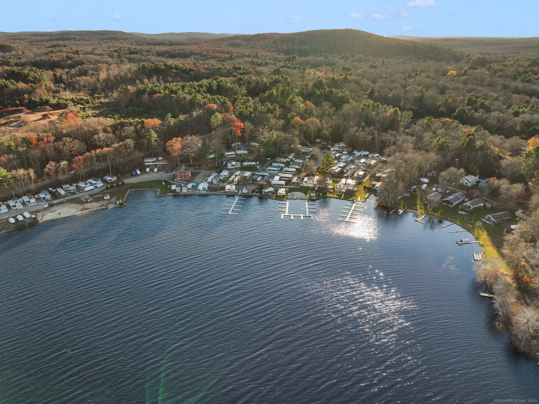 262 Shetucket Turnpike, Unit 69 Griswold, CT 06351 - Photo 33 of 37 an aerial view of ocean with residential houses with outdoor space and lake view