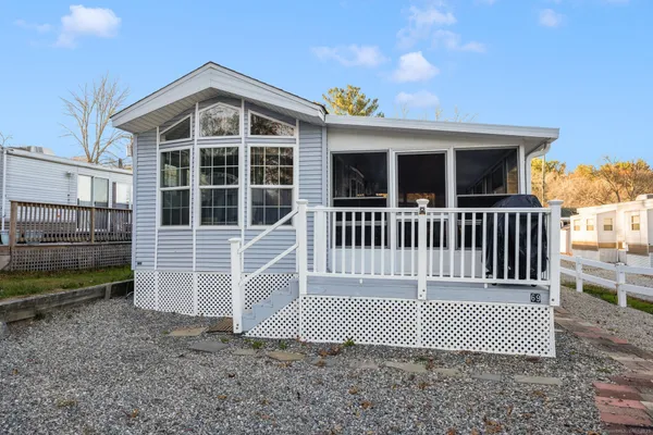 front view of a house with a deck