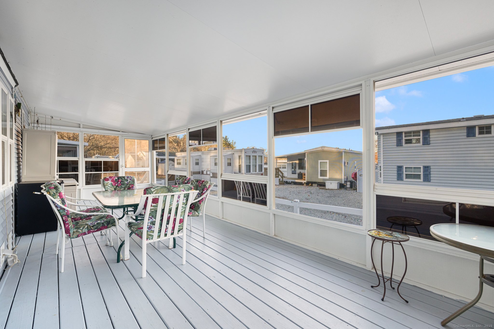 262 Shetucket Turnpike, Unit 69 Griswold, CT 06351 - Photo 9 of 37 a view of a dining room with furniture and wooden floor