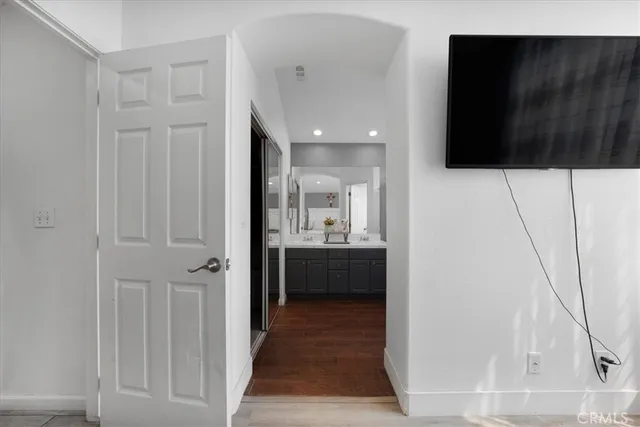a bathroom with a sink and mirror