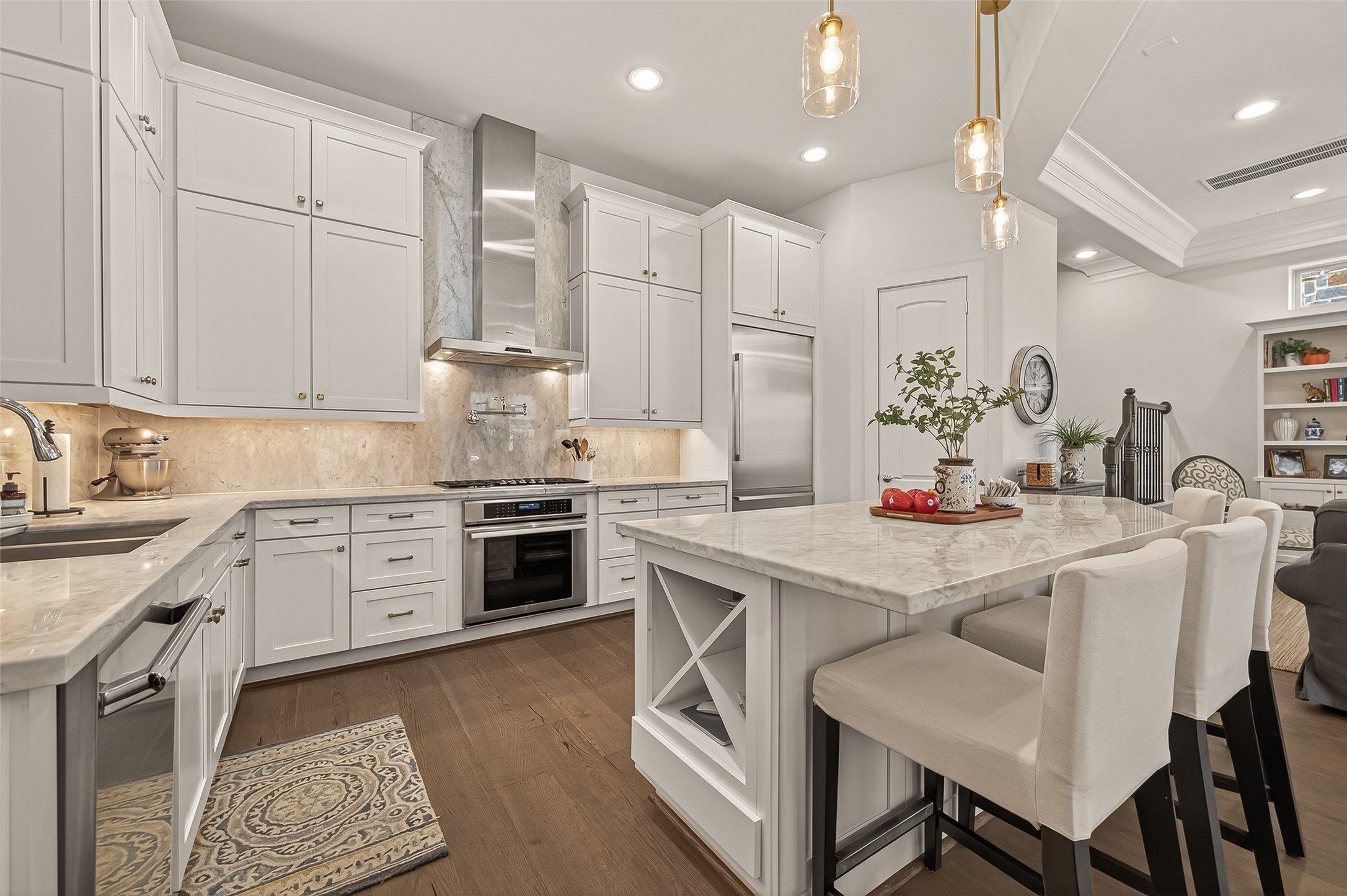 1607 West Rose Terrace Lane Houston, TX 77055 - Photo 11 of 46 Wine storage, updated lighting fixtures and beautiful flooring.