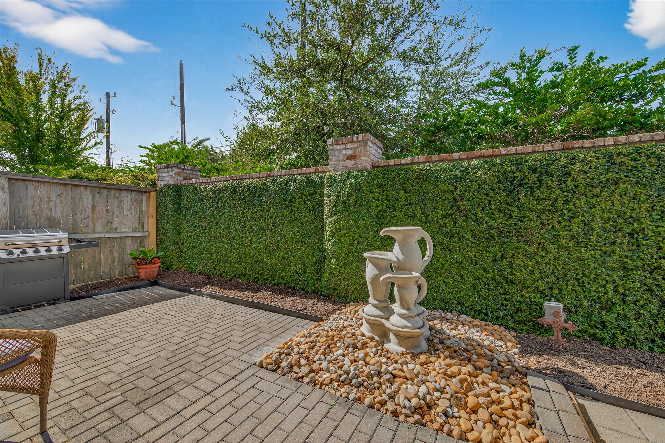 1607 West Rose Terrace Lane Houston, TX 77055 - Photo 43 of 46 Pristine patio, with fountain.