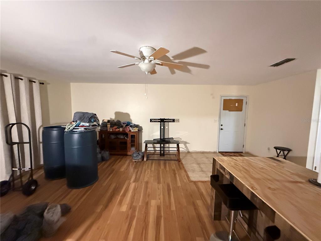 9302 Southeast Maricamp Road Ocala, FL 34472 - Photo 14 of 40 a living room with furniture