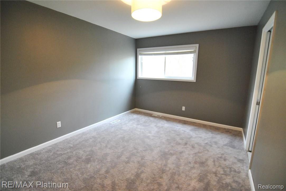 24566 Border Hill Novi, MI 48375 - Photo 12 of 26 Master bedroom suite with new carpet and paint