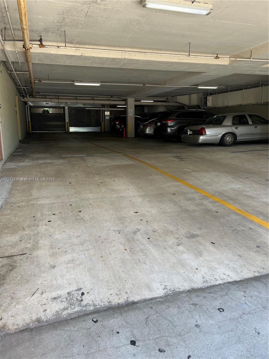 2351 Douglas Road, Unit 910 Miami, FL 33145 - Photo 15 of 24 a view of a garage