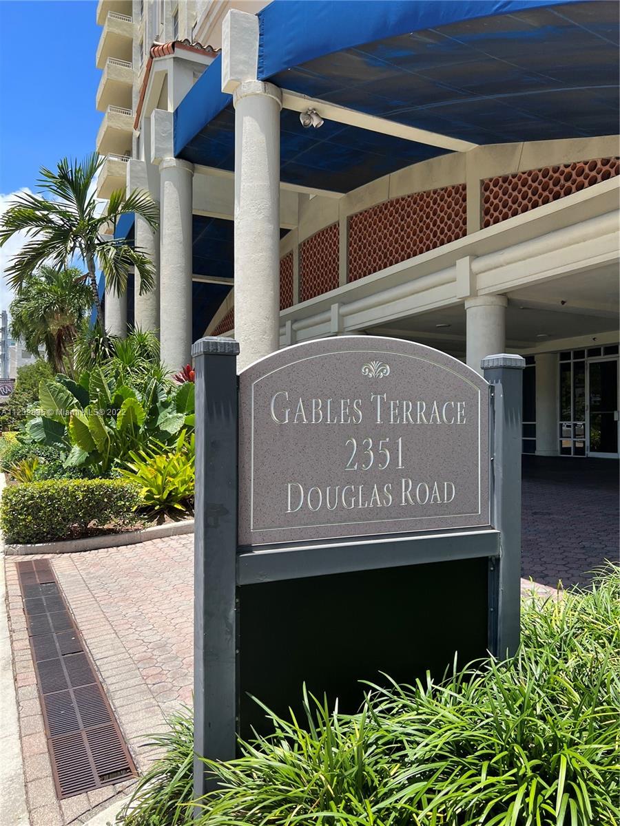2351 Douglas Road, Unit 910 Miami, FL 33145 - Photo 2 of 24 a sign on the side of a building