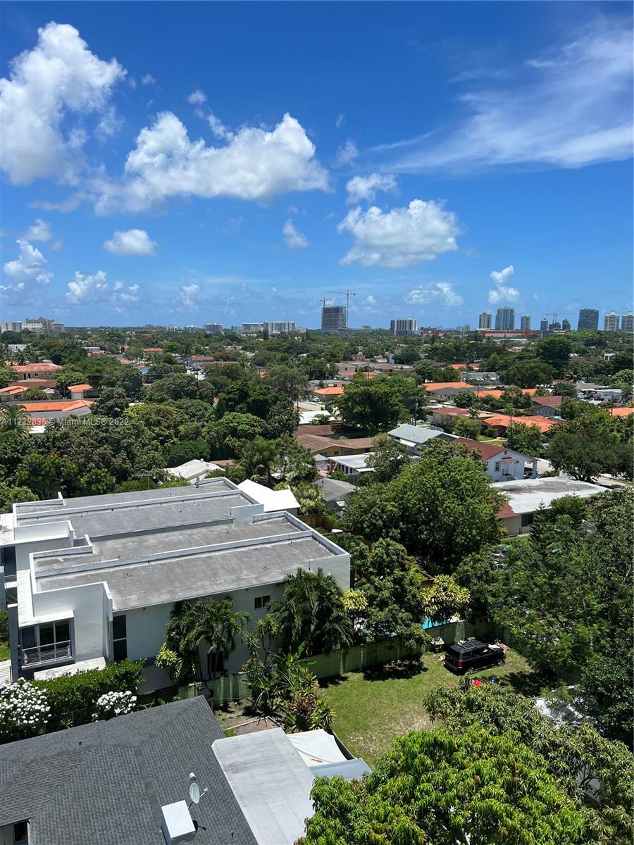 2351 Douglas Road, Unit 910 Miami, FL 33145 - Photo 24 of 24 an aerial view of residential houses with outdoor space and street view