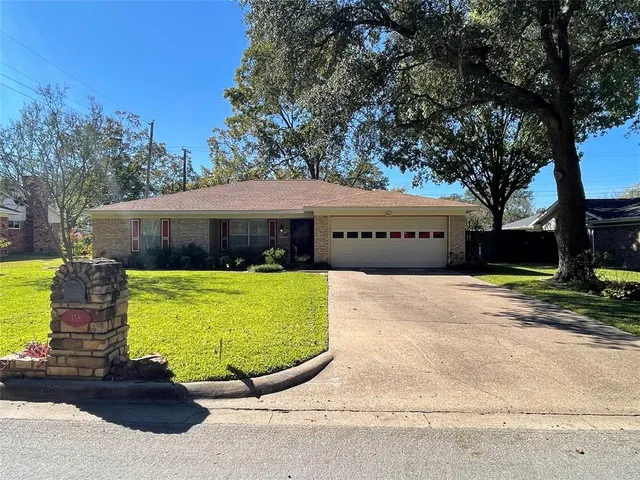 a view of a house with a swimming pool