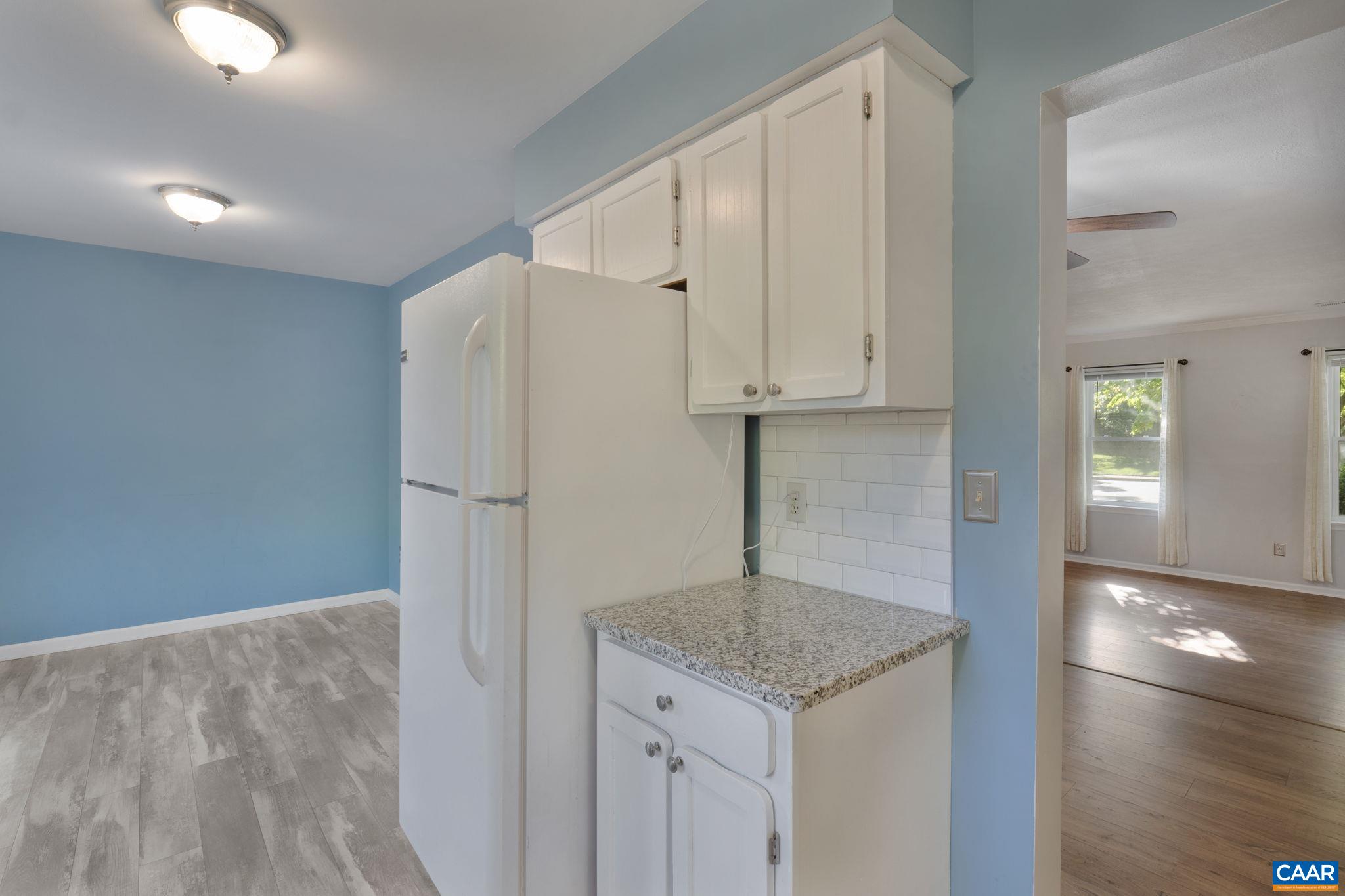 1522 Minor Ridge Court Charlottesville, VA 22901 - Photo 13 of 29 a kitchen with stainless steel appliances granite countertop a refrigerator and a sink