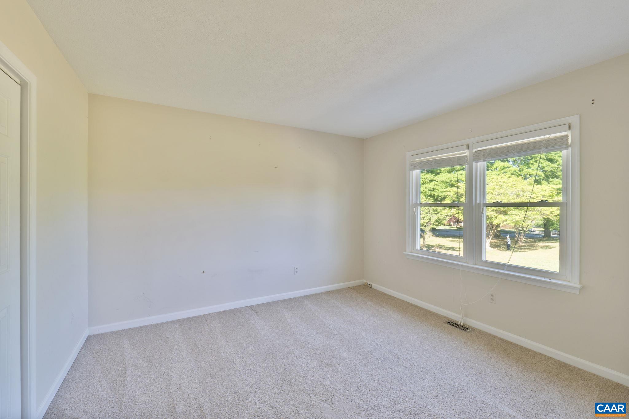1522 Minor Ridge Court Charlottesville, VA 22901 - Photo 18 of 29 an empty room with a window