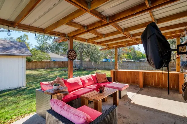 a view of yard with patio