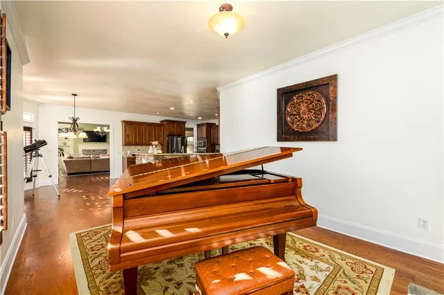 a view of a livingroom with workspace and a couch