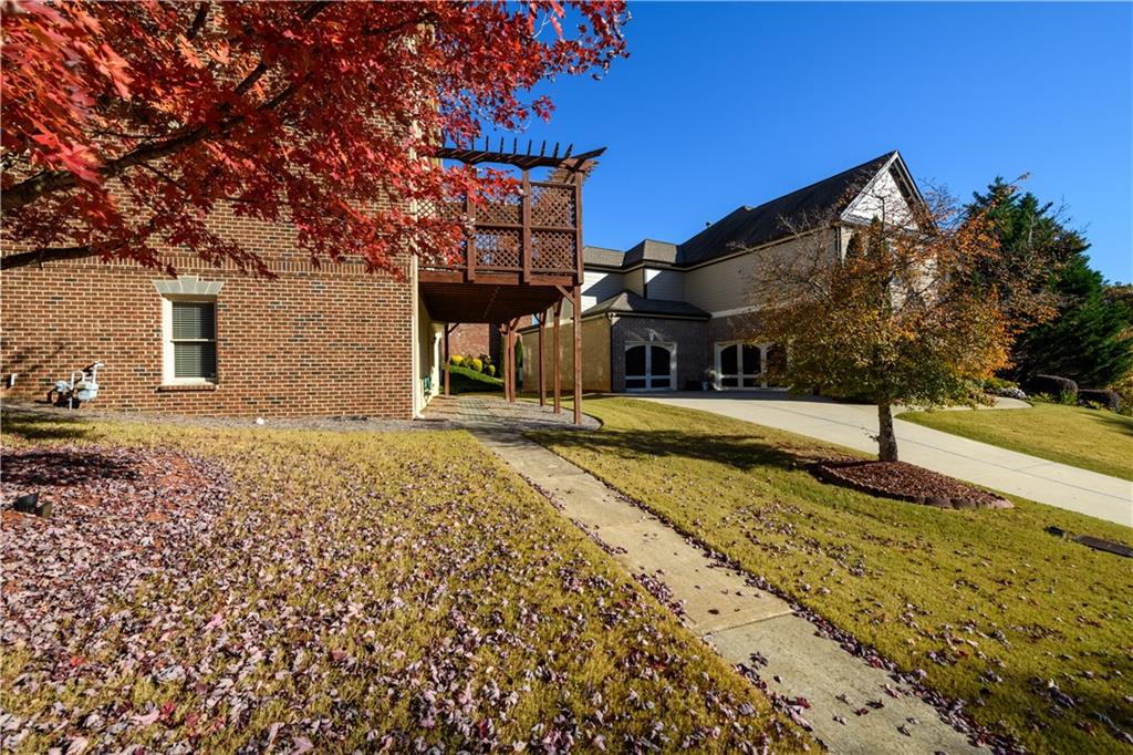 2070 Trinity Mill Drive Dacula, GA 30019 - Photo 36 of 46 a house with trees in front of it