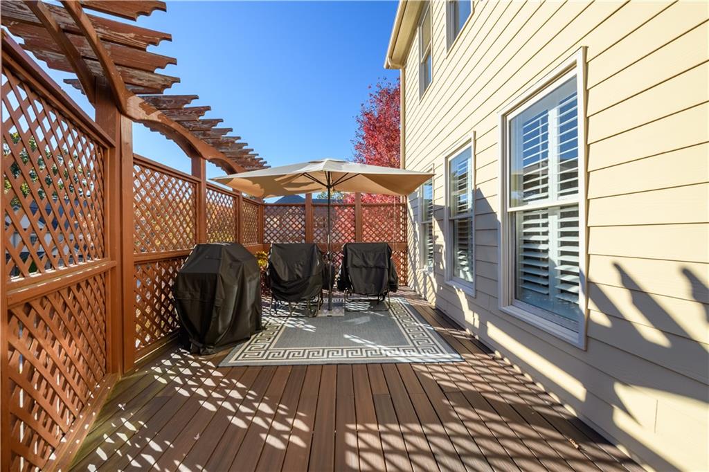 2070 Trinity Mill Drive Dacula, GA 30019 - Photo 37 of 46 a view of a house with a patio and wooden floor
