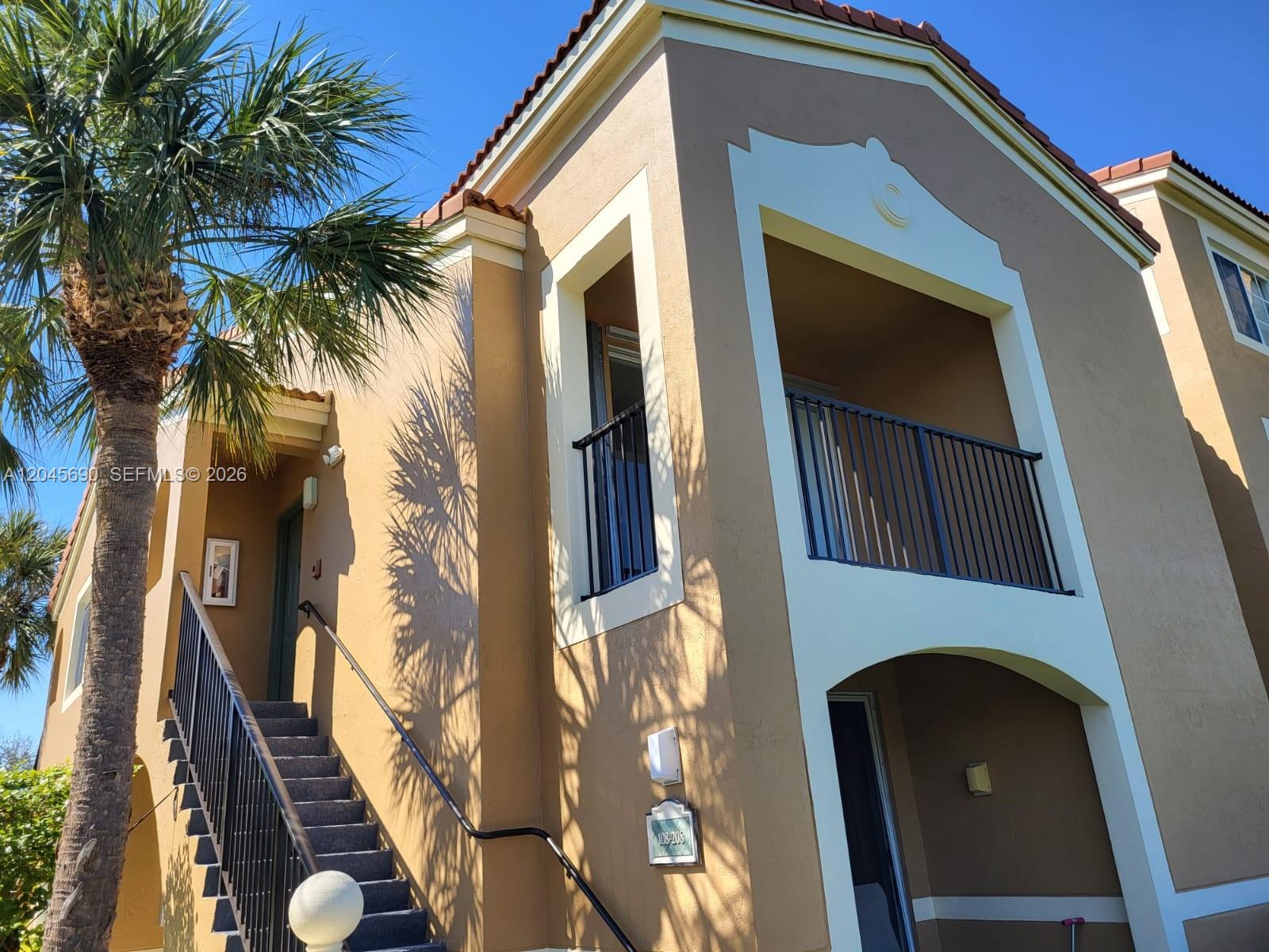 8070 North Nob Hill Road, Unit 208 Tamarac, FL 33321 - Photo 10 of 16 a view of front door