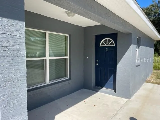 a view of a hallway with entryway