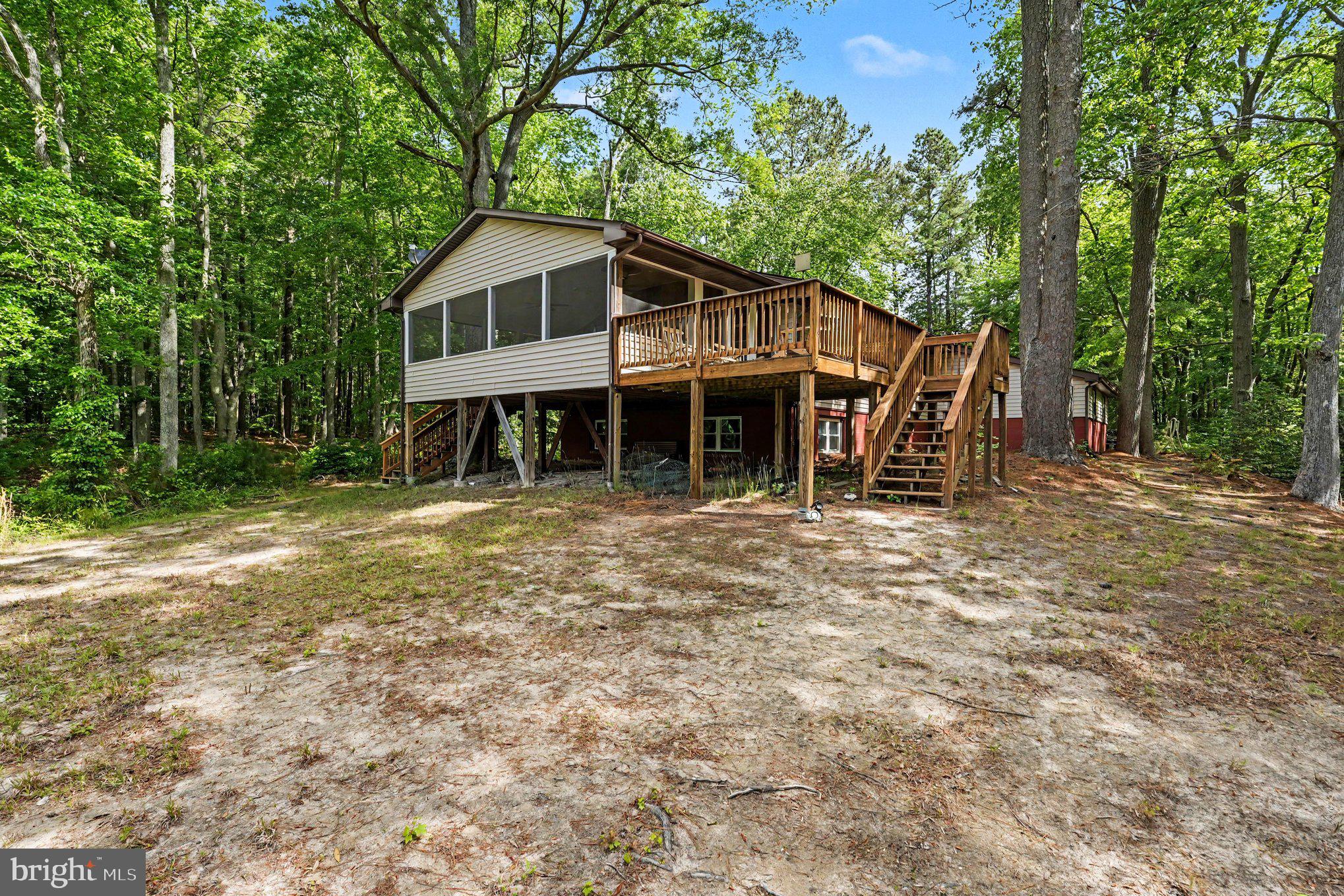 306 Liberty Road Reedville, VA 22539 - Photo 5 of 46 Back of the house with 16x20 screened porch & deck