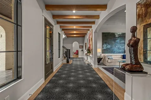 a view of a hallway with a couch