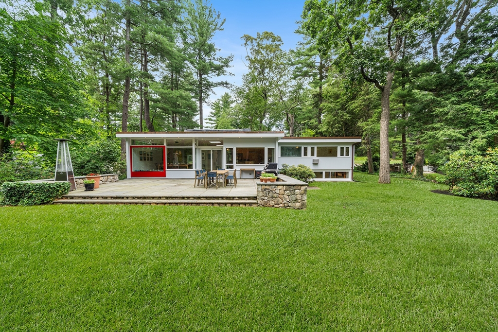 32 Moon Hill Road Lexington, MA 02421 - Photo 1 of 34 a view of a house with a yard patio and swimming pool