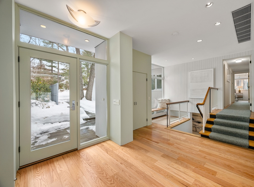 32 Moon Hill Road Lexington, MA 02421 - Photo 11 of 34 a view of an empty room with wooden floor and a window