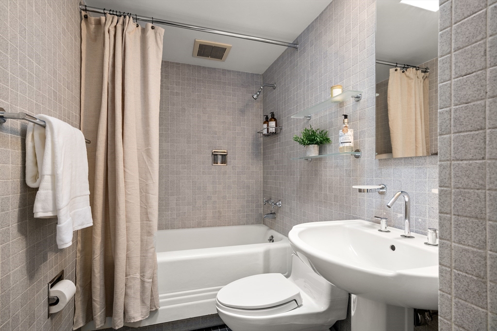 32 Moon Hill Road Lexington, MA 02421 - Photo 16 of 34 a bathroom with a sink toilet and shower