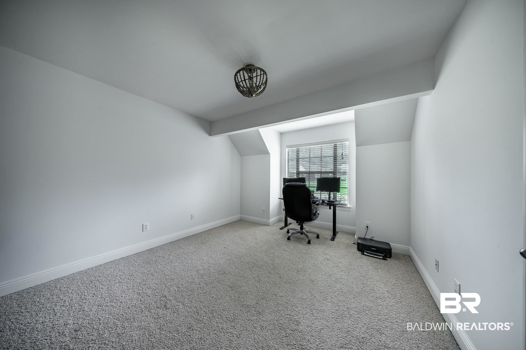 8421 Weatherford Court Daphne, AL 36527 - Photo 28 of 36 Carpeted home office featuring baseboards and vaulted ceiling