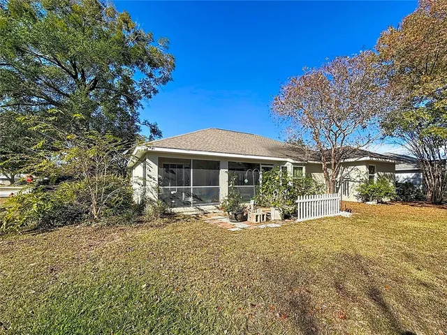 a view of a chairs and tables in the patio