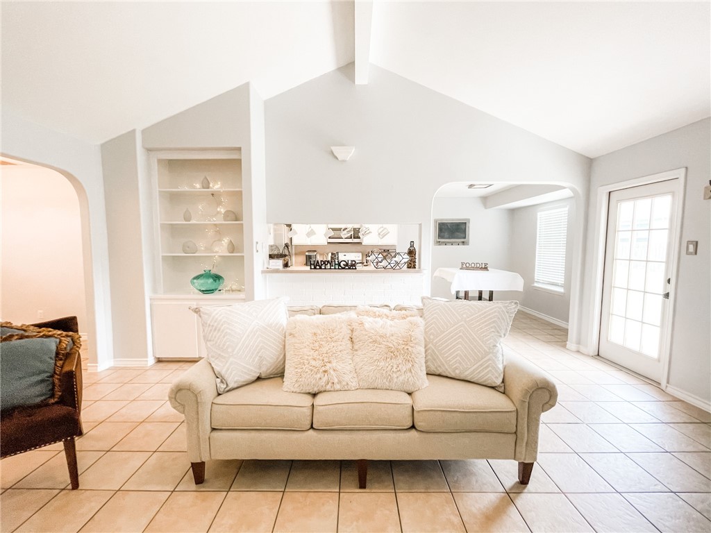 13901 Lighthouse Drive Corpus Christi, TX 78418 - Photo 12 of 38 a living room with furniture and a large window