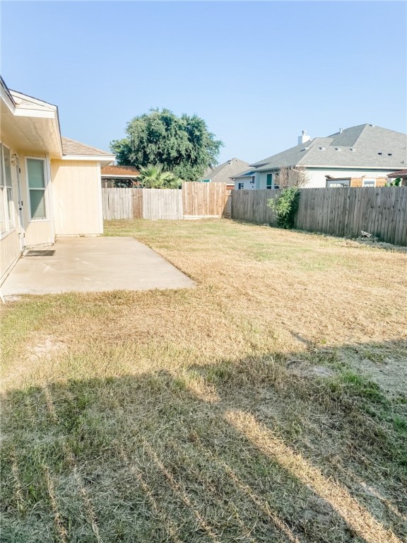 13901 Lighthouse Drive Corpus Christi, TX 78418 - Photo 37 of 38 a front view of a house with a yard