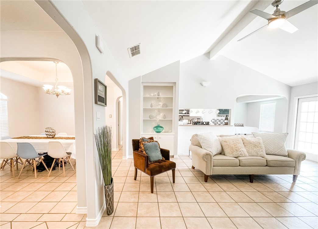 13901 Lighthouse Drive Corpus Christi, TX 78418 - Photo 4 of 38 a living room with furniture and a large window