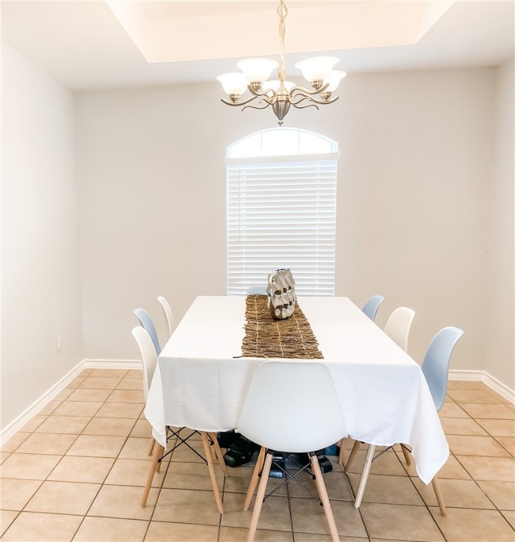 13901 Lighthouse Drive Corpus Christi, TX 78418 - Photo 8 of 38 a view of a dining room with furniture and wooden floor