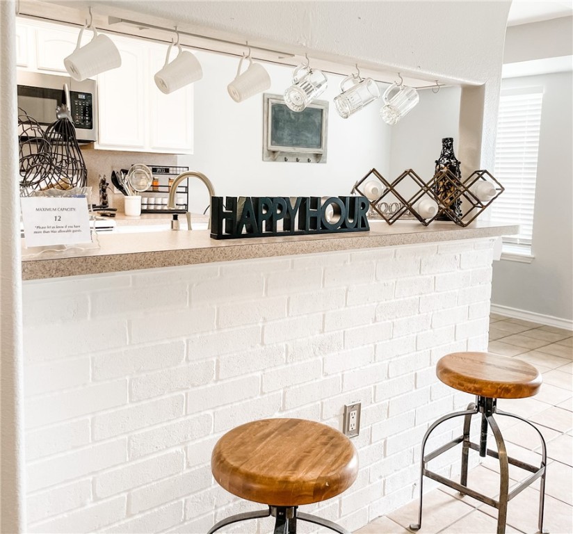 13901 Lighthouse Drive Corpus Christi, TX 78418 - Photo 9 of 38 a view of a sink and chair in a room