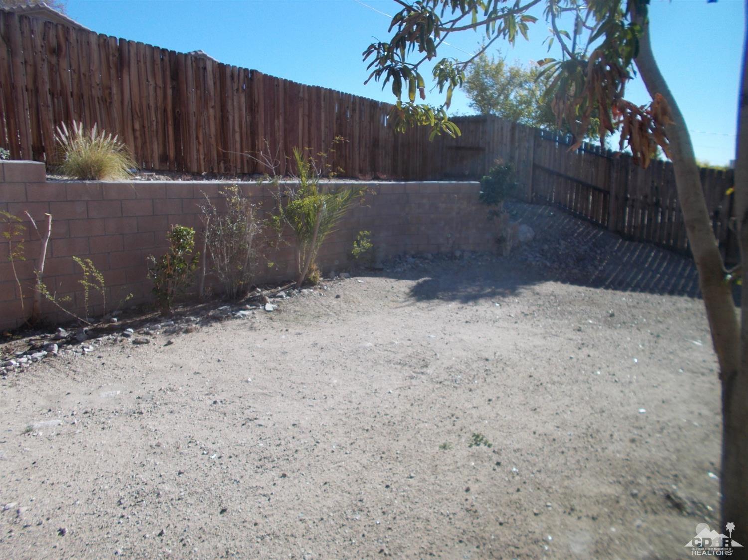 13080 Mountain View Road Desert Hot Springs, CA 92240 - Photo 11 of 11 a backyard of a house