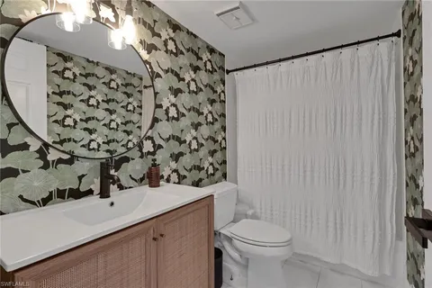 a view of storage and utility room with washer and dryer