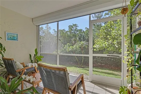 a view of a living room and a porch