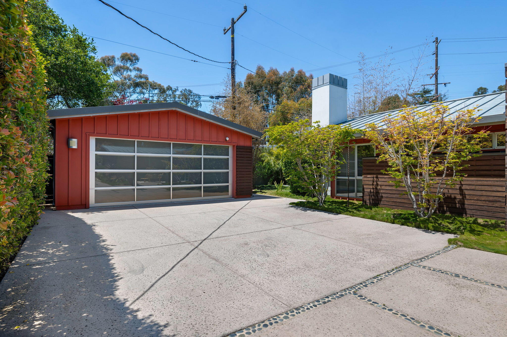 175 Hermosillo Road Montecito, CA 93108 - Photo 14 of 19 a front view of a house with a yard and garage