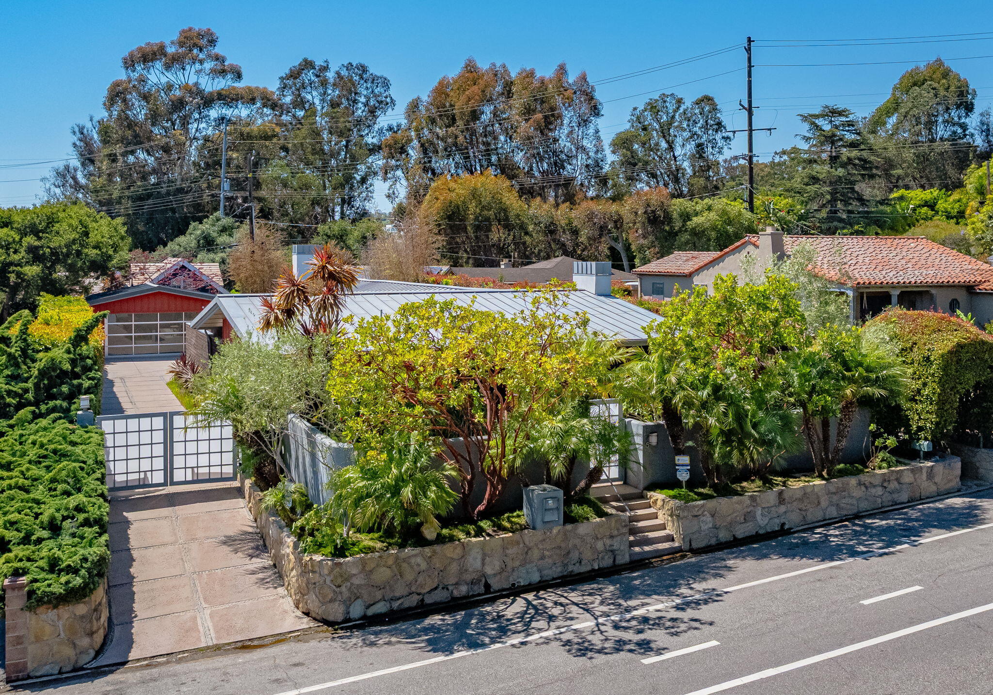 175 Hermosillo Road Montecito, CA 93108 - Photo 17 of 19 a view of a garden with a fountain