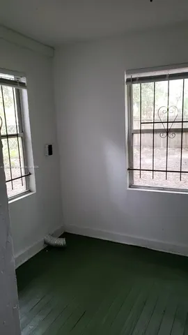 an empty room with a window
