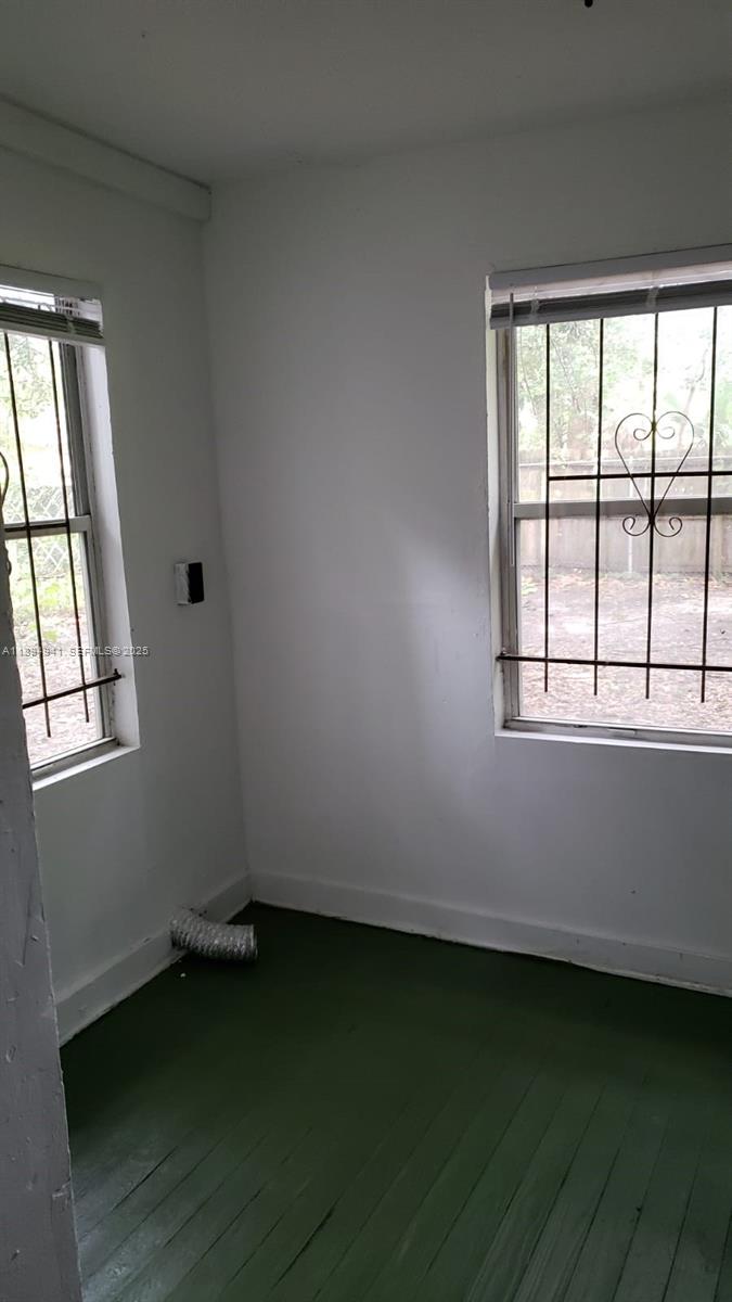 1517 Logan Street Jacksonville, FL 32209 - Photo 3 of 30 an empty room with a window
