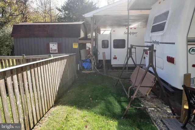 a view of a balcony with chairs