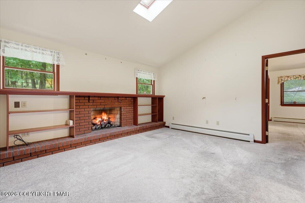 209 Foothill Boulevard Effort, PA 18330 - Photo 19 of 61 Family Room Fireplace