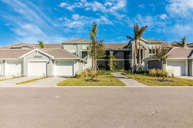 a front view of a building with street view