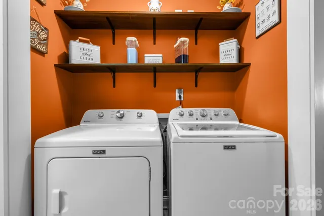 a utility room with dryer and washer